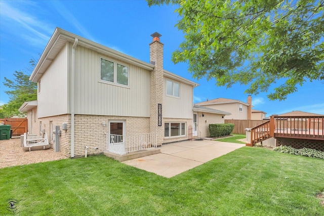 16560 Currant Ave, Tinley Park, IL 60487 - back of house featuring brick siding, a deck, a chimney, and a patio