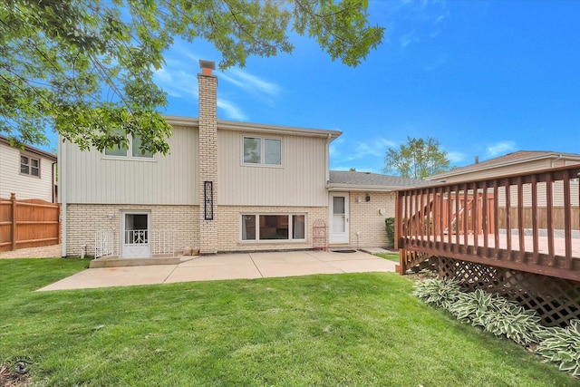 16560 Currant Ave, Tinley Park, IL 60487 - back of house featuring brick siding, a wooden deck, a chimney, and a patio