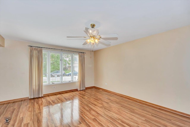 16560 Currant Ave, Tinley Park, IL 60487 - unfurnished room with light wood-type flooring, baseboards, and a ceiling fan