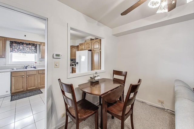 311 S Vine Ave Unit C, Park Ridge, IL 60068 - dining space with ceiling fan, light tile patterned floors, and baseboards