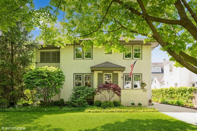 310 Fairview Ave, Winnetka, IL 60093 - view of front of home featuring stucco siding and a front lawn