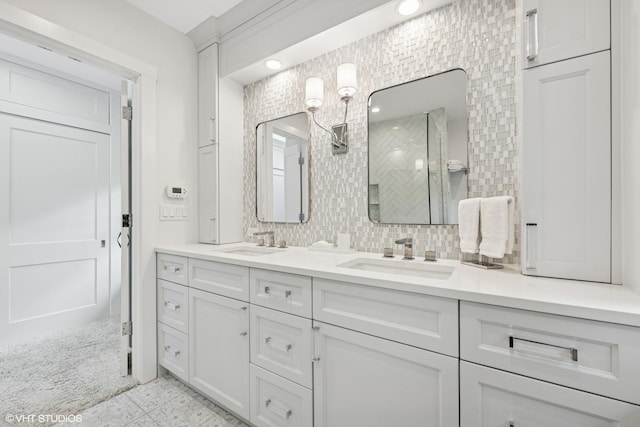 310 Fairview Ave, Winnetka, IL 60093 - full bathroom featuring double vanity, tiled shower, and backsplash