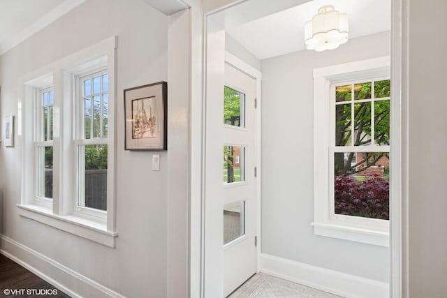 310 Fairview Ave, Winnetka, IL 60093 - doorway to outside with baseboards and healthy amount of natural light