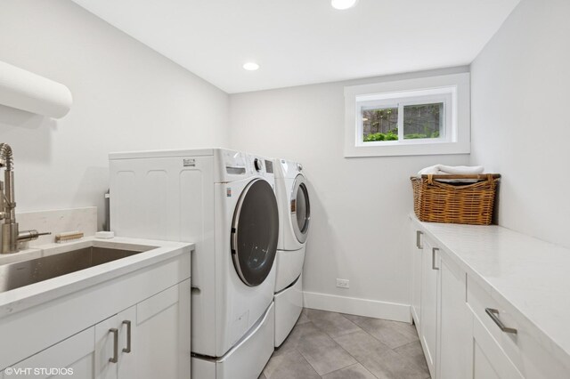 310 Fairview Ave, Winnetka, IL 60093 - washroom featuring washing machine and dryer, cabinet space, baseboards, light tile patterned flooring, and recessed lighting