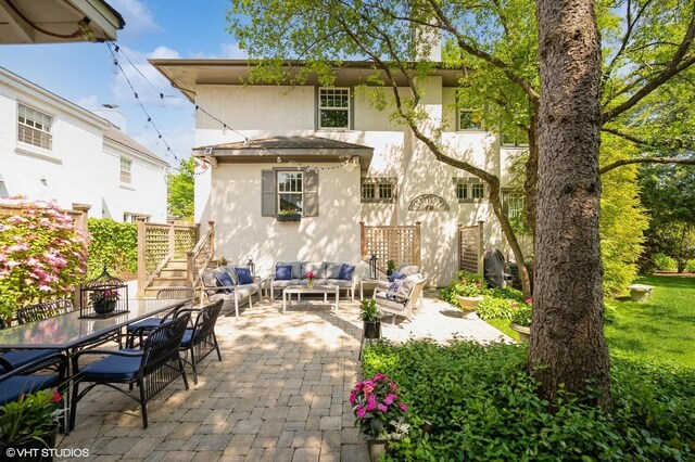 310 Fairview Ave, Winnetka, IL 60093 - view of patio / terrace with stairs, an outdoor living space, and outdoor dining area