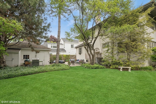 310 Fairview Ave, Winnetka, IL 60093 - view of grassy yard featuring an outdoor structure, a patio, and an outdoor living space