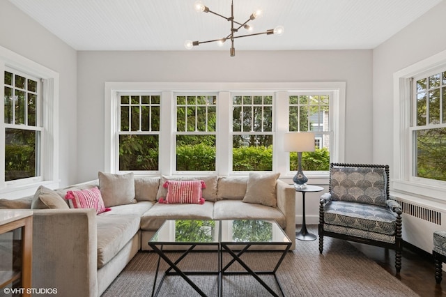 310 Fairview Ave, Winnetka, IL 60093 - sunroom featuring radiator heating unit and a chandelier