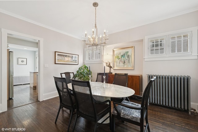310 Fairview Ave, Winnetka, IL 60093 - dining area with radiator heating unit, a chandelier, dark wood finished floors, baseboards, and crown molding
