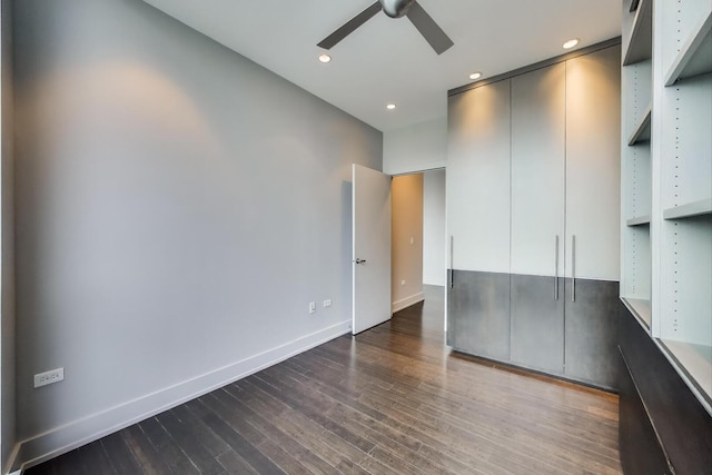 110 W Superior St Unit 1703, Chicago, IL 60654 - unfurnished bedroom with dark wood-style flooring, baseboards, recessed lighting, and ceiling fan