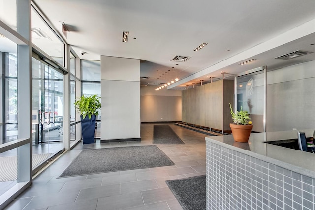 110 W Superior St Unit 1703, Chicago, IL 60654 - building lobby featuring expansive windows