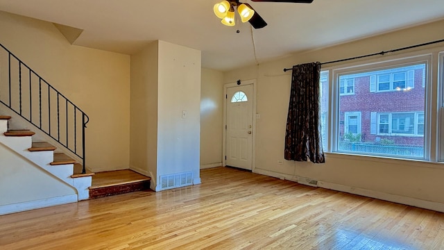 9344 Noel Ave Unit B, Des Plaines, IL 60016 - entrance foyer featuring wood finished floors, a ceiling fan, baseboards, and stairway