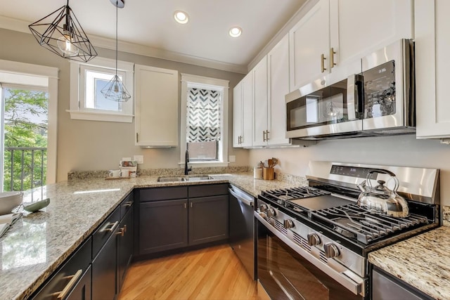 3706 W Wrightwood Ave Unit 3A, Chicago, IL 60647 - kitchen featuring stainless steel appliances, a sink, white cabinets, and recessed lighting