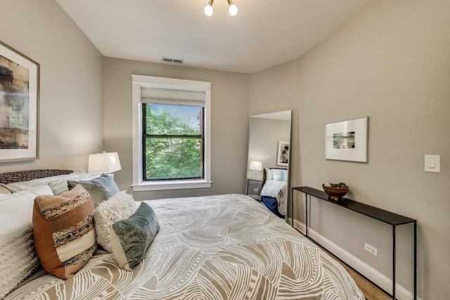 3706 W Wrightwood Ave Unit 3A, Chicago, IL 60647 - bedroom featuring wood finished floors and baseboards
