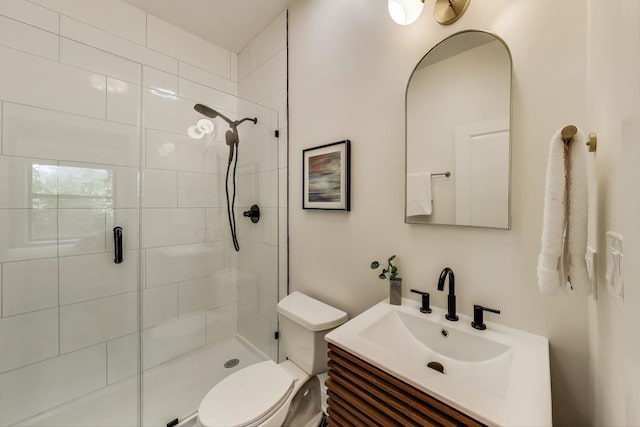 3706 W Wrightwood Ave Unit 3A, Chicago, IL 60647 - full bathroom with a stall shower, toilet, and vanity