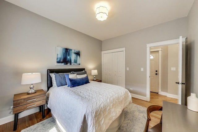 3706 W Wrightwood Ave Unit 3A, Chicago, IL 60647 - bedroom featuring baseboards, wood finished floors, and a closet