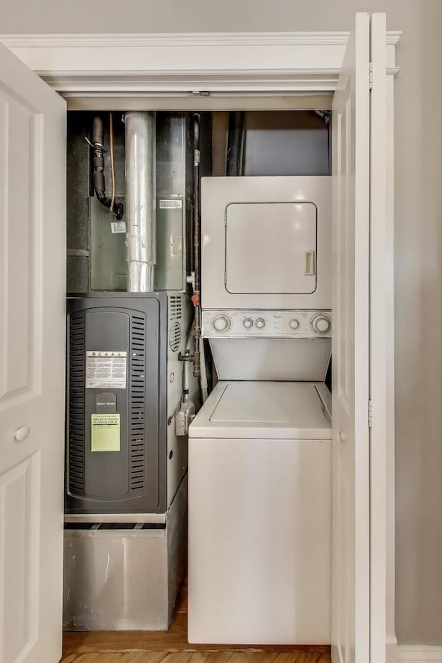 3706 W Wrightwood Ave Unit 3A, Chicago, IL 60647 - washroom featuring stacked washer / dryer