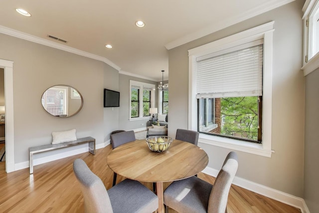 3706 W Wrightwood Ave Unit 3A, Chicago, IL 60647 - dining space with light wood finished floors, baseboards, crown molding, and recessed lighting