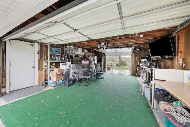 5106 W 64th St, Chicago, IL 60638 - garage with a workshop area and a garage door opener