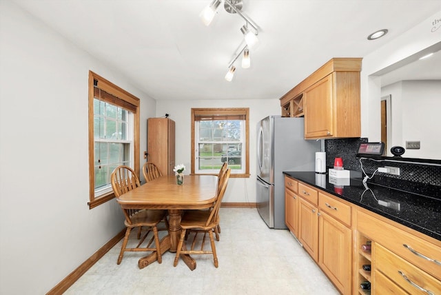 5106 W 64th St, Chicago, IL 60638 - kitchen with baseboards, decorative backsplash, freestanding refrigerator, and light brown cabinetry