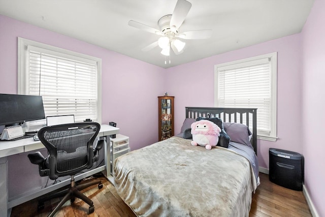 5106 W 64th St, Chicago, IL 60638 - bedroom featuring multiple windows, wood-type flooring, a desk, and ceiling fan