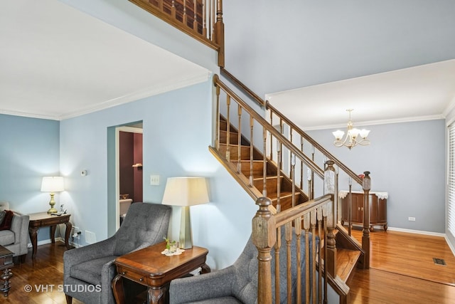 303 College Xing, Rolling Meadows, IL 60008 - stairs featuring wood finished floors, crown molding, and a chandelier