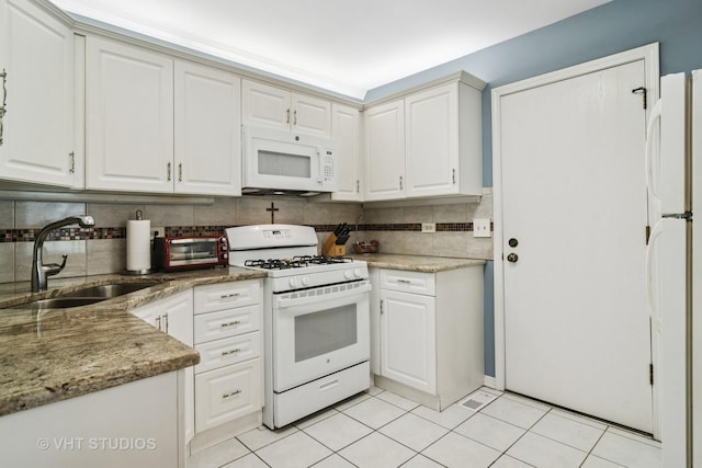 303 College Xing, Rolling Meadows, IL 60008 - kitchen featuring white appliances, decorative backsplash, light tile patterned floors, and white cabinetry