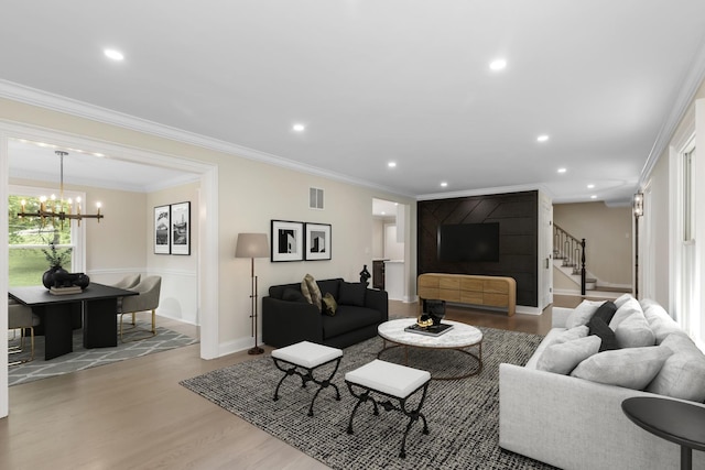 420 N E Gateway Dr, Tower Lakes, IL 60010 - living area with stairs, wood finished floors, a chandelier, ornamental molding, and recessed lighting