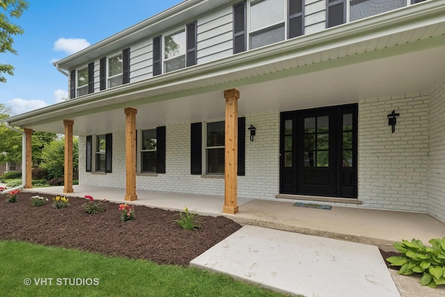 420 N E Gateway Dr, Tower Lakes, IL 60010 - entrance to property with covered porch and brick siding