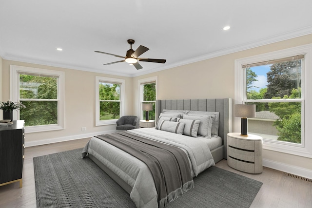 420 N E Gateway Dr, Tower Lakes, IL 60010 - bedroom featuring multiple windows, baseboards, crown molding, wood finished floors, and recessed lighting