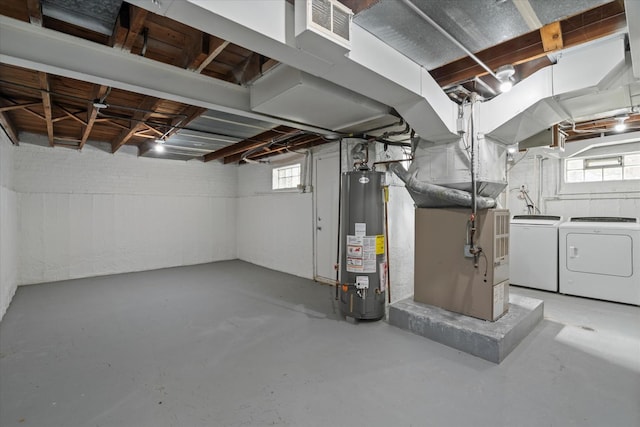 3601 S 57th Ct, Cicero, IL 60804 - basement with water heater, washer and clothes dryer, and healthy amount of natural light