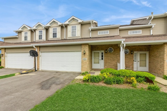 3856 Pathfinder Ln, Joliet, IL 60435 - multi unit property with driveway, brick siding, and a garage