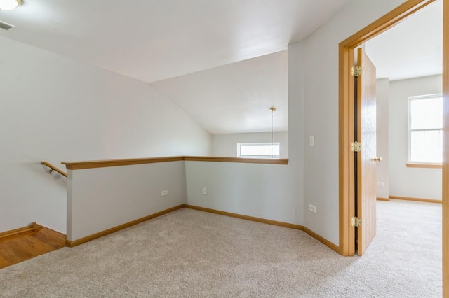 3856 Pathfinder Ln, Joliet, IL 60435 - empty room with carpet flooring, baseboards, and vaulted ceiling