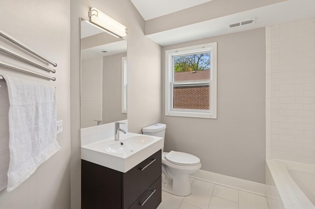 2415 W Washburne Ave, Chicago, IL 60608 - full bathroom with vanity, toilet, baseboards, and tile patterned floors