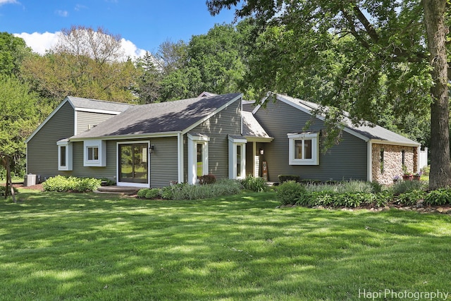 1504 N Denali Trl, Mchenry, IL 60050 - view of front of property featuring a front yard, central AC, and a shingled roof