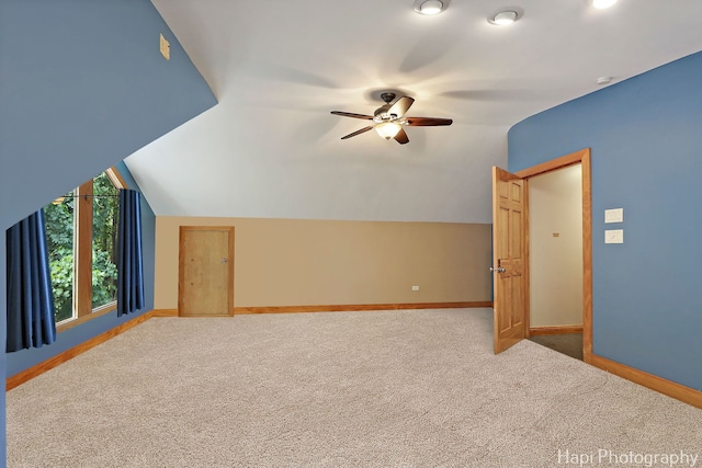 1504 N Denali Trl, Mchenry, IL 60050 - additional living space with carpet flooring, vaulted ceiling, baseboards, and a ceiling fan
