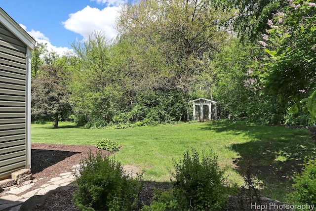 1504 N Denali Trl, Mchenry, IL 60050 - view of green lawn with an outbuilding