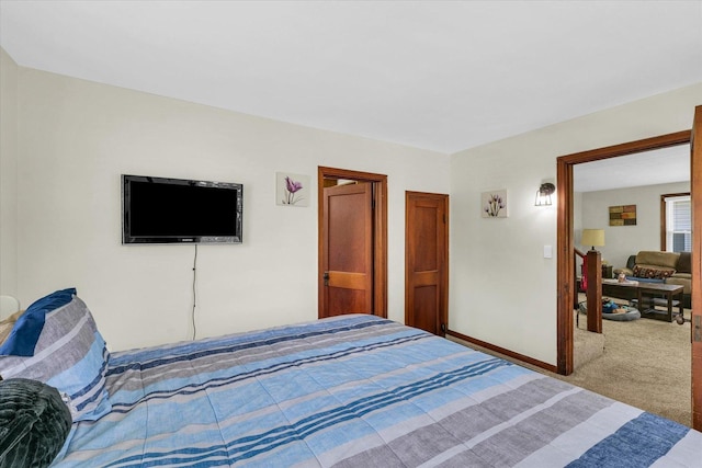 308 W Spruce St, Paxton, IL 60957 - bedroom with carpet and baseboards