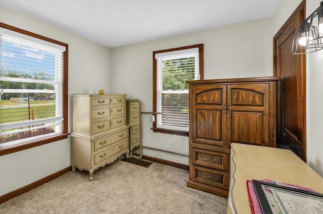308 W Spruce St, Paxton, IL 60957 - bedroom featuring baseboards and light carpet