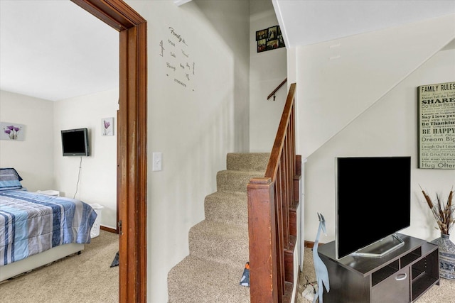 308 W Spruce St, Paxton, IL 60957 - stairway featuring carpet flooring