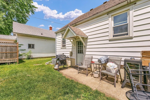 308 W Spruce St, Paxton, IL 60957 - back of property featuring a yard