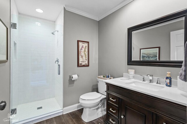 3302 Kingswood Ct, Joliet, IL 60431 - full bathroom featuring a shower stall, toilet, vanity, wood finished floors, and ornamental molding