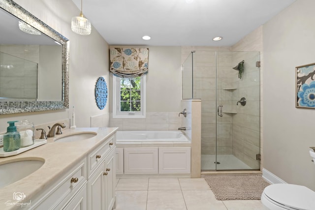 3302 Kingswood Ct, Joliet, IL 60431 - bathroom with a bath, a shower stall, tile patterned floors, double vanity, and toilet