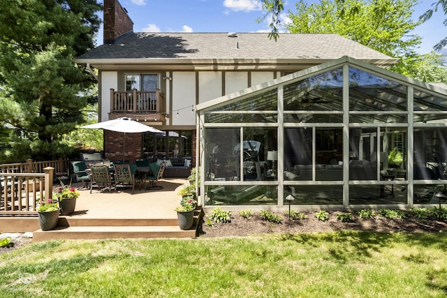3302 Kingswood Ct, Joliet, IL 60431 - rear view of house featuring a chimney, a shingled roof, stucco siding, and a lawn