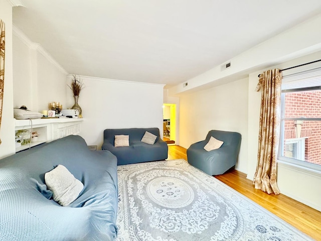 6228 N Artesian Ave, Chicago, IL 60659 - living room with wood finished floors and crown molding