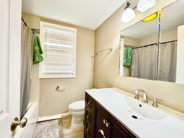 6228 N Artesian Ave, Chicago, IL 60659 - full bathroom with vanity, toilet, baseboards, and shower / bath combo