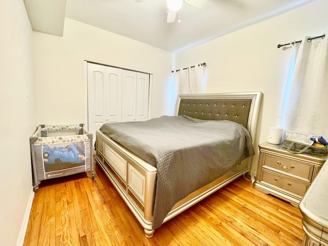 6228 N Artesian Ave, Chicago, IL 60659 - bedroom featuring light wood-type flooring, a closet, a ceiling fan, and baseboards
