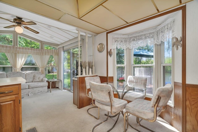 75 Largemouth Ln, Wilmington, IL 60481 - dining space with plenty of natural light, ceiling fan, vaulted ceiling, wainscoting, and light carpet