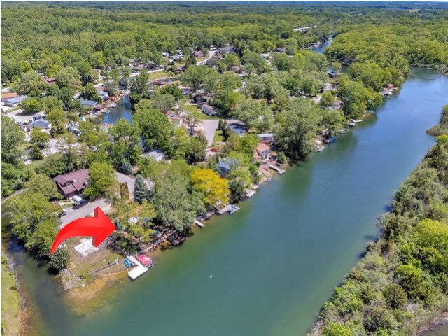 75 Largemouth Ln, Wilmington, IL 60481 - drone / aerial view of a heavily wooded area and a large body of water