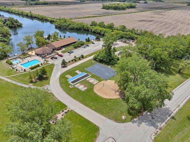 75 Largemouth Ln, Wilmington, IL 60481 - drone / aerial view of a large body of water and a pool area
