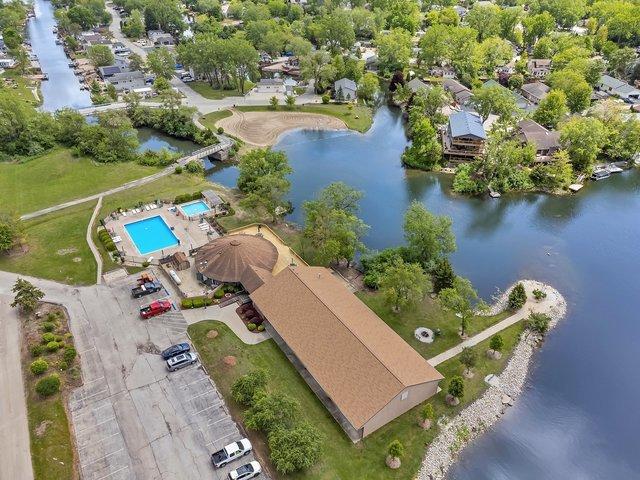 75 Largemouth Ln, Wilmington, IL 60481 - bird's eye view of a pool area and a nearby body of water